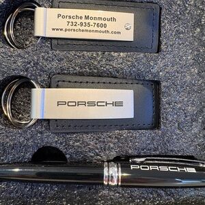 Porsche of Monmouth 2 Black Logo Pens and 4 Key Chains